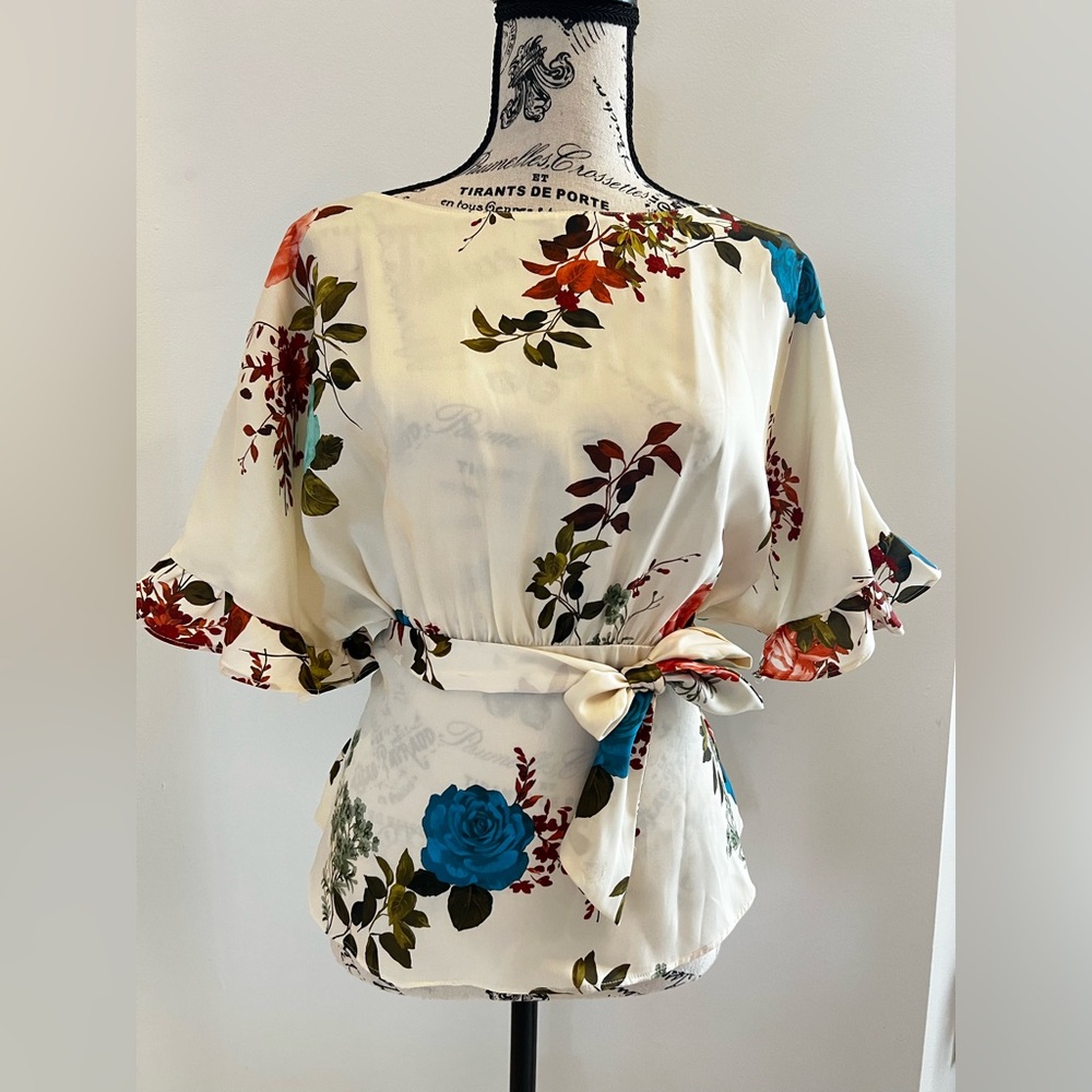 Zara Floral Satin Top with open back and tie waist.